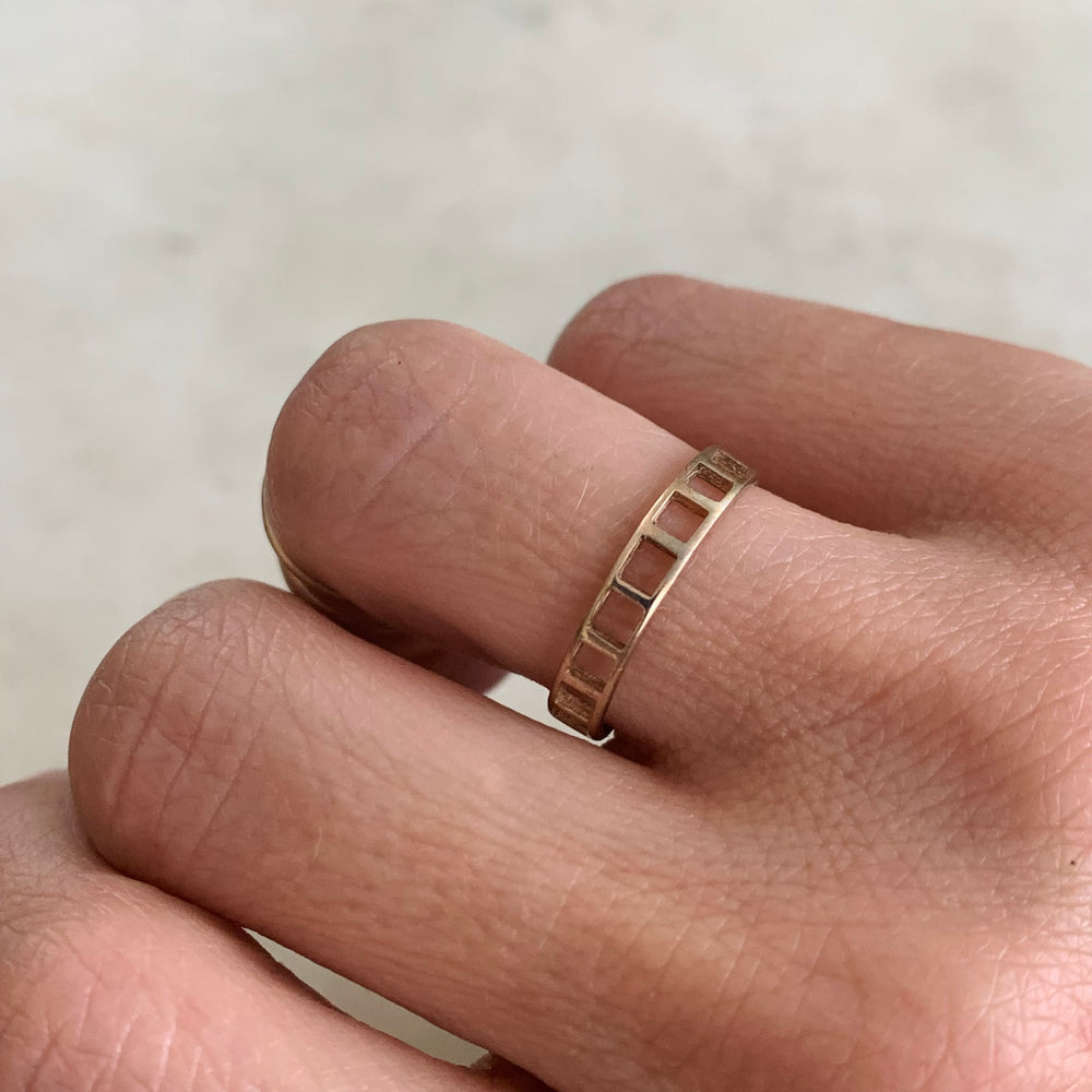Woman Wearing Handmade Bronze Single Row Grid Ring