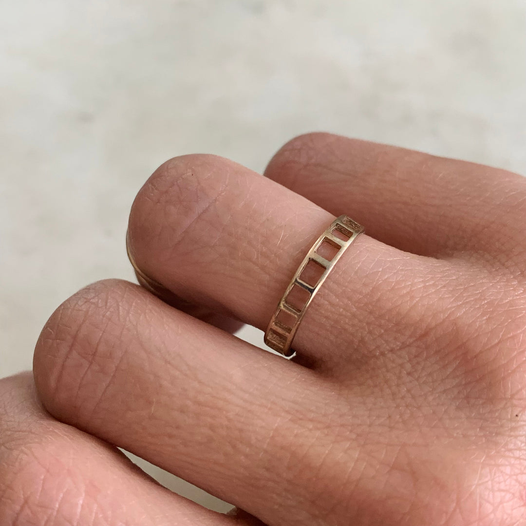 Woman Wearing Handmade Bronze Single Row Grid Ring