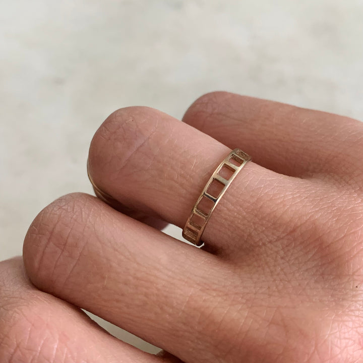 Woman Wearing Handmade Bronze Single Row Grid Ring