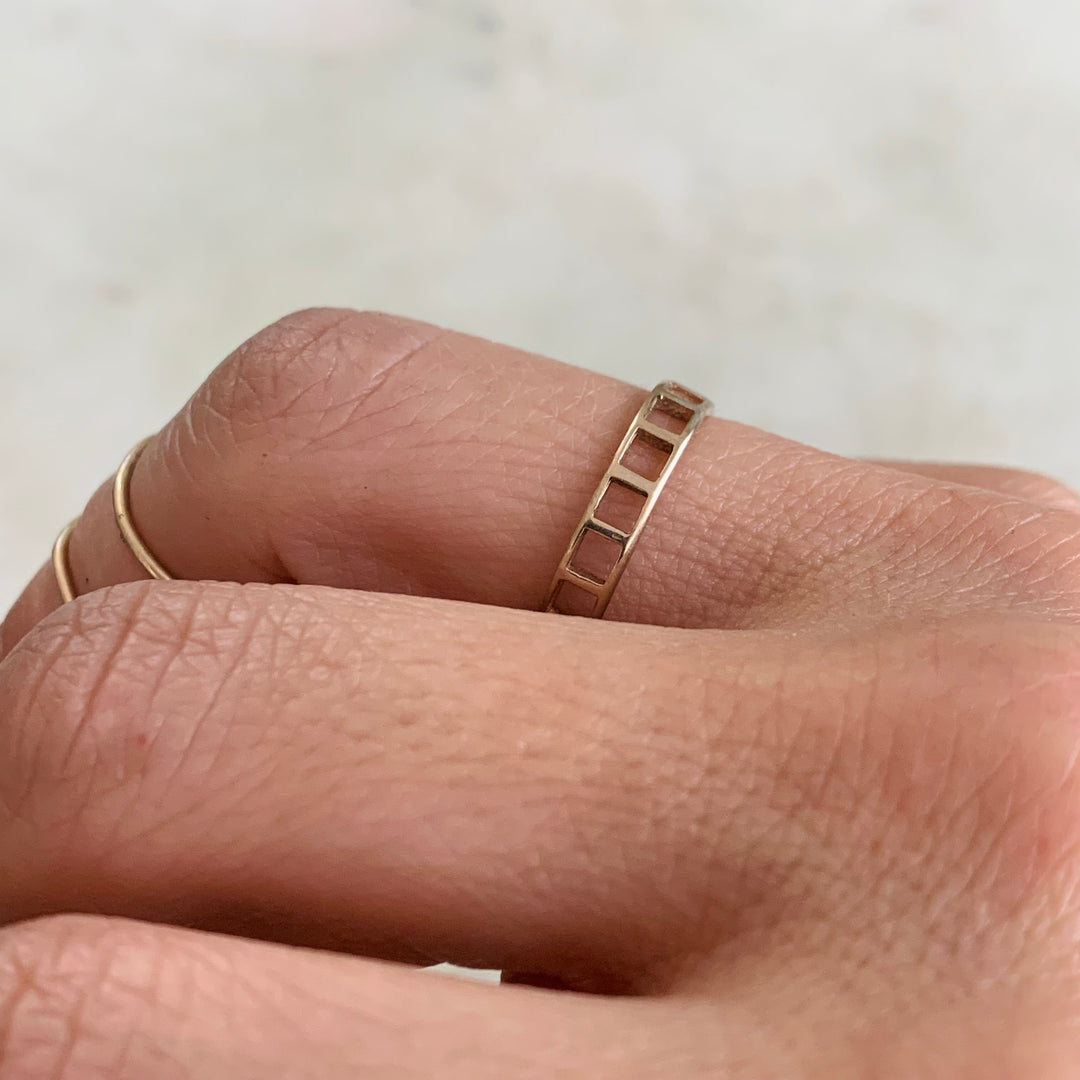 Woman Wearing Handmade Bronze Single Row Grid Ring