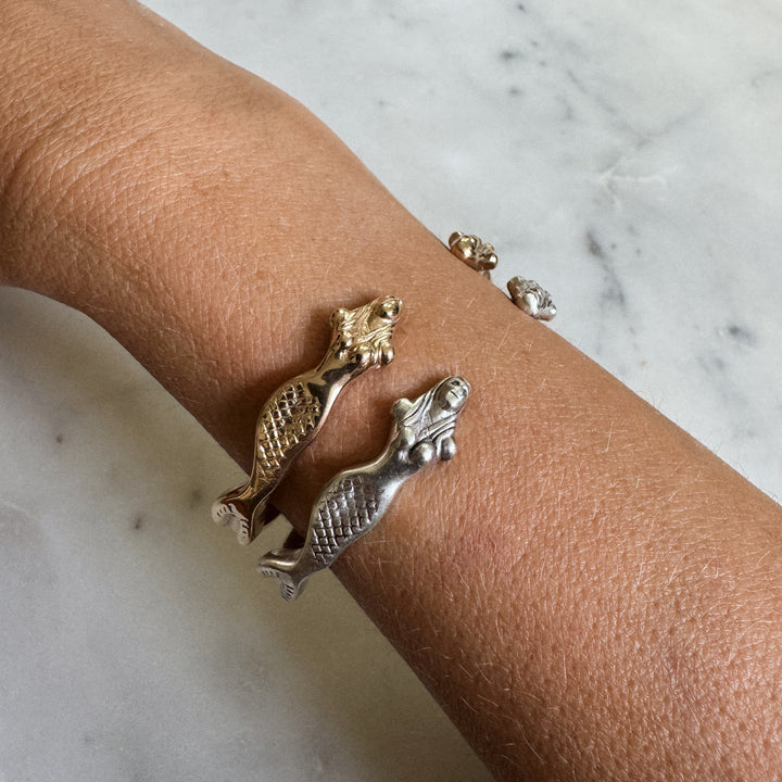 Person Wears the MIMOSA Handcrafted Mermaid Bracelet in Bronze and Sterling Silver