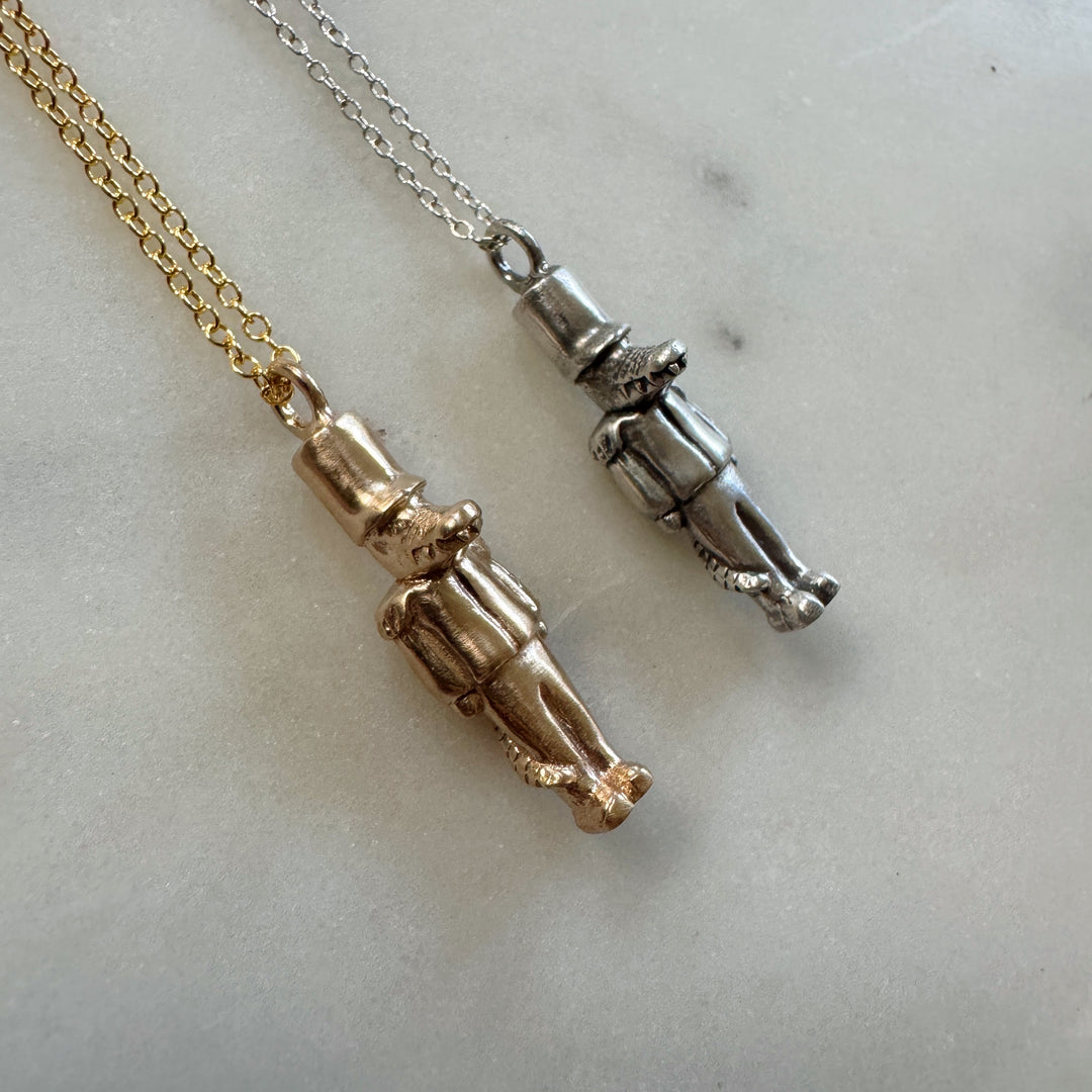 nutcracker necklace in bronze and sterling silver