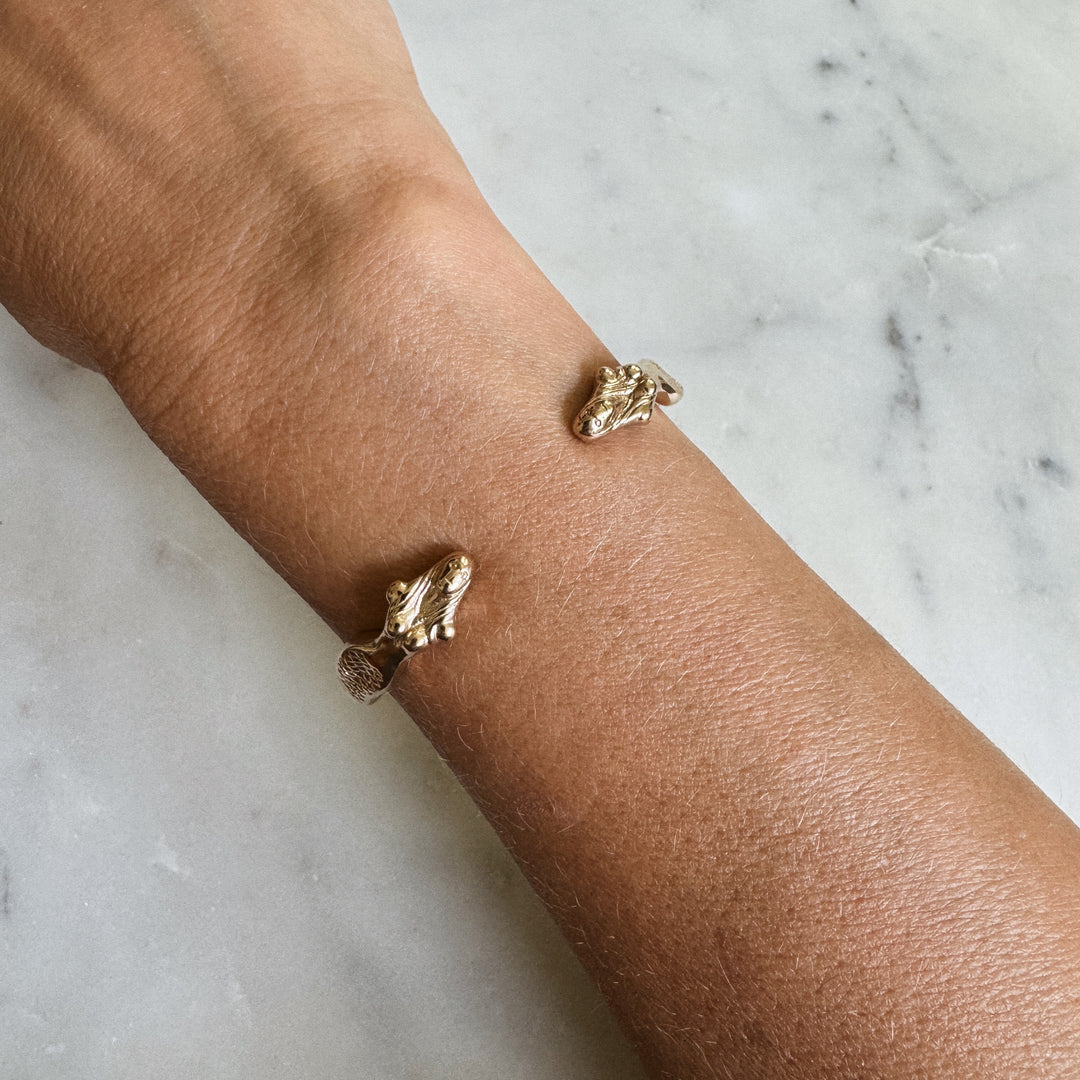 Person Wears the MIMOSA Handcrafted Mermaid Bracelet in Bronze