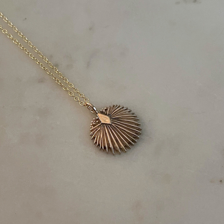 Small Gold Palmetto Leaf Pendant from MIMOSA Handcrafted