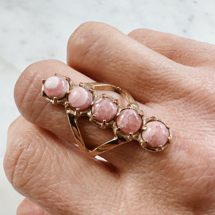 ROW RING — RHODOCHROSITE