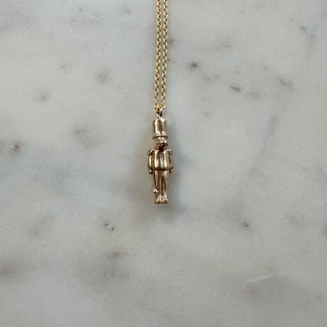 nutcracker necklace in bronze