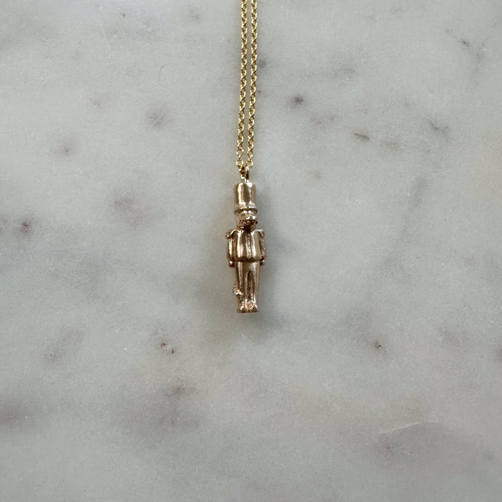 nutcracker necklace in bronze
