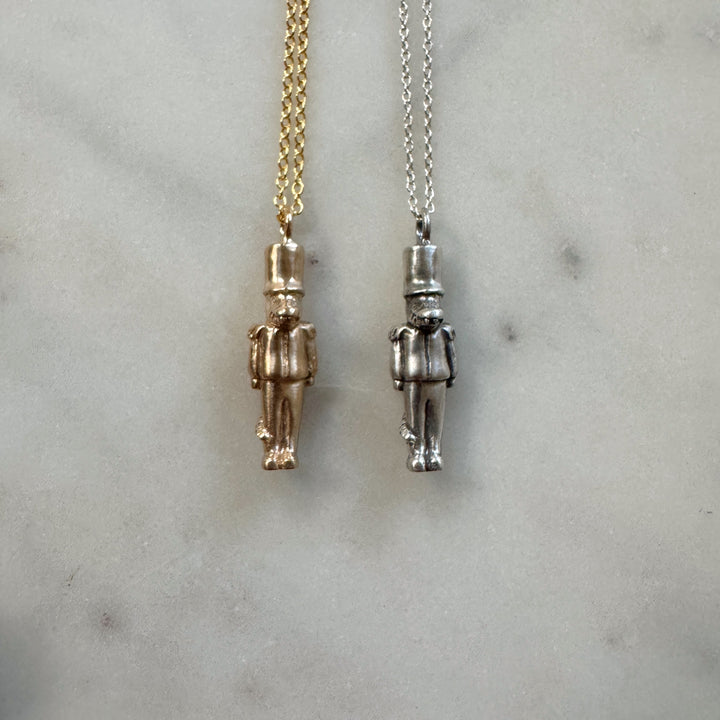 nutcracker necklace in bronze and sterling silver