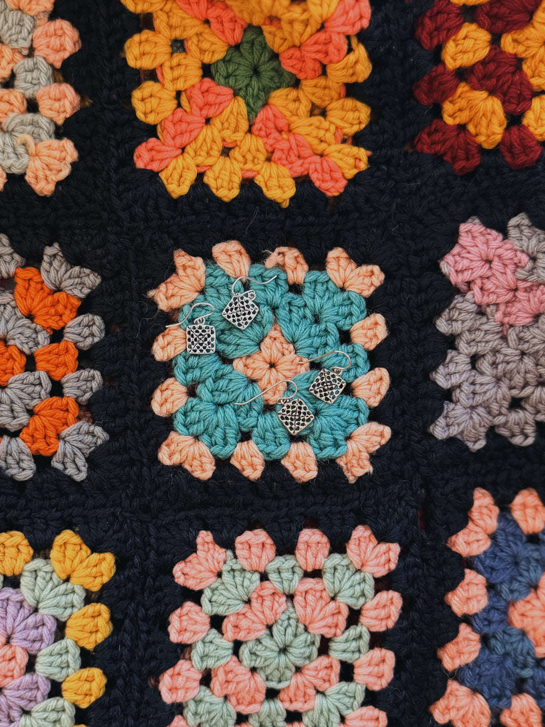 Handmade granny square earrings in bronze and sterling silver