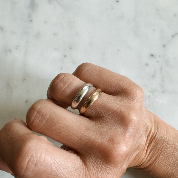 Person Wears the MIMOSA Handcrafted Petite Amanda Dome Ring in Sterling Silver and Bronze