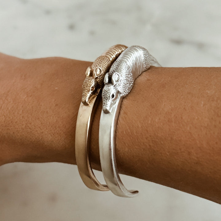 Woman Wears the MIMOSA Handcrafted Armadillo Bracelet in Bronze and Sterling Silver