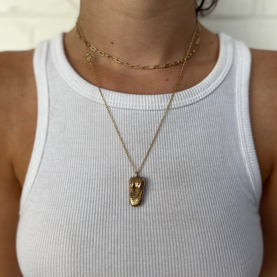 Woman Wearing Handcrafted Bronze Alligator Pendant Necklace