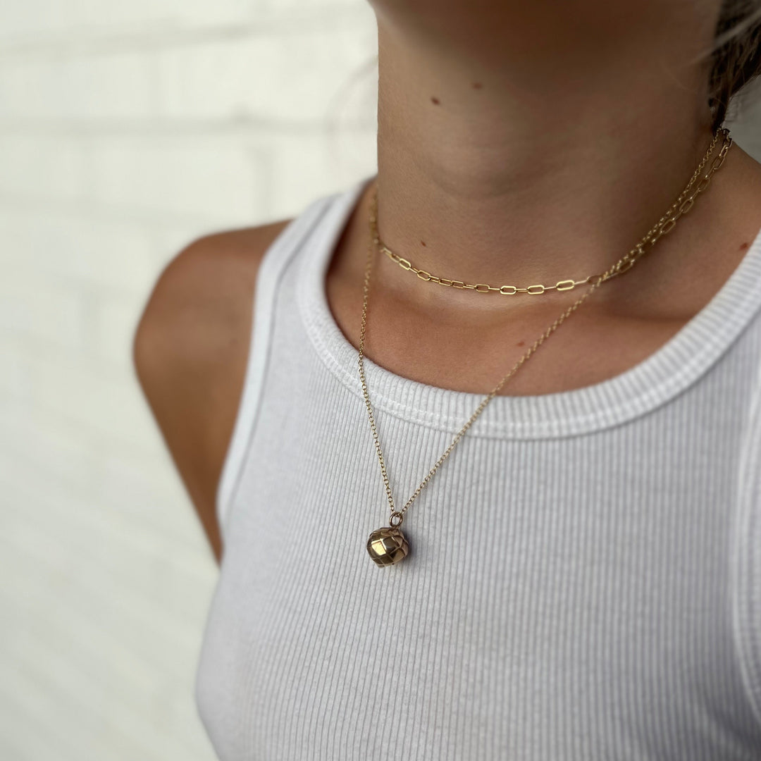 Woman Wearing Handcrafted Bronze Artichoke Pendant Necklace