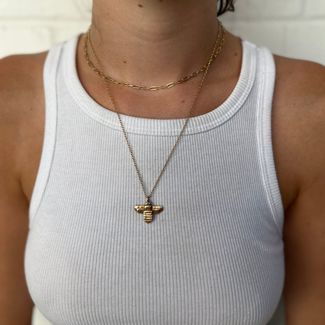 Woman Wearing Handcrafted Bee Pendant Necklace
