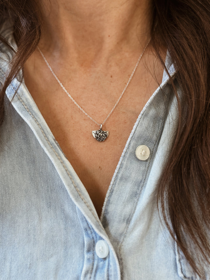 Woman Wears the MIMOSA Handcrafted Small Camellia Flower Necklace in Sterling Silver