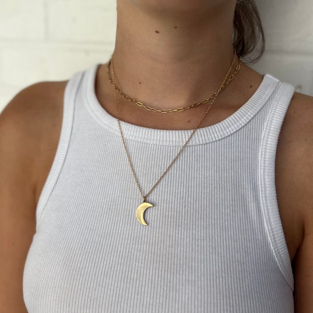 Woman Wearing Handcrafted Crescent Moon Pendant Necklace