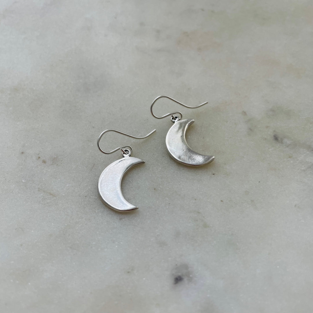 Charmed! Rhodium plate open crescent moon earrings on hypoallergenic s –  SeaCycled Glass