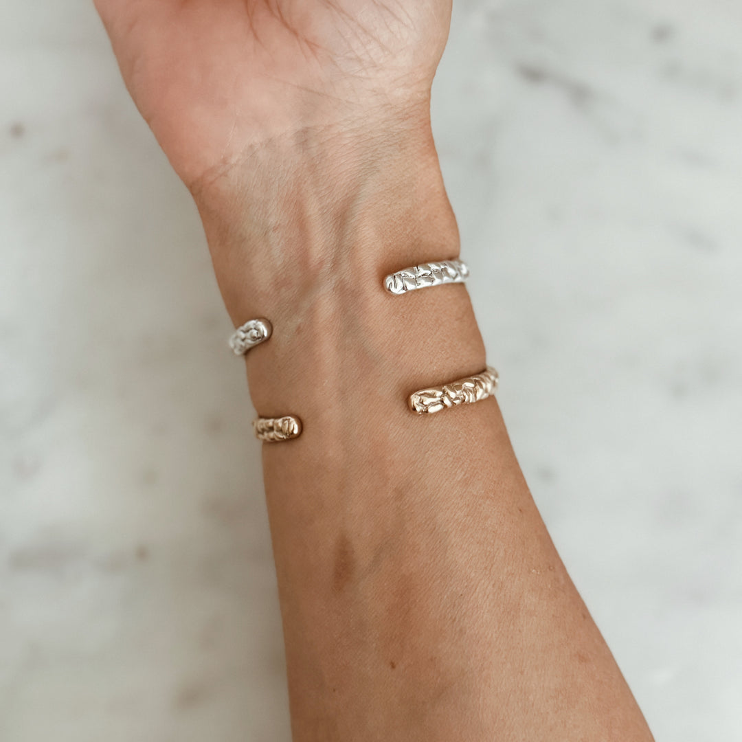 Woman Wears the MIMOSA Handcrafted Osage Orange Bracelet in Bronze and Sterling Silver