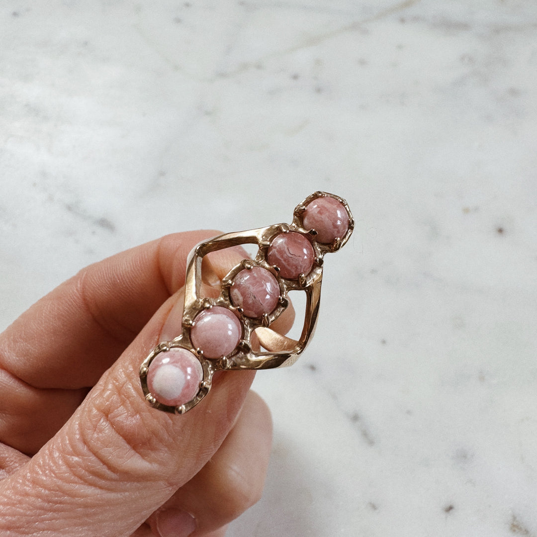 ROW RING — RHODOCHROSITE