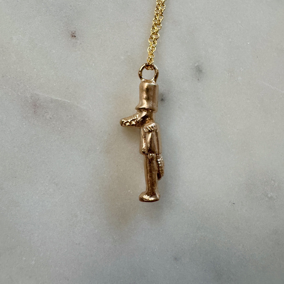 nutcracker necklace in bronze