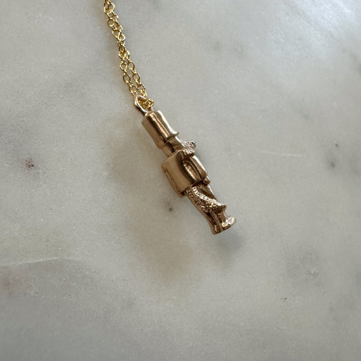 nutcracker necklace in bronze