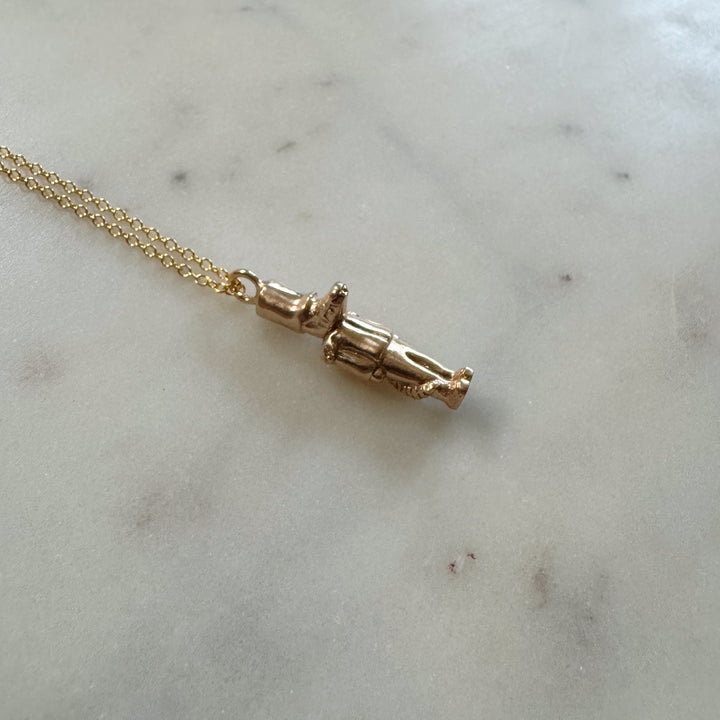 nutcracker necklace in bronze