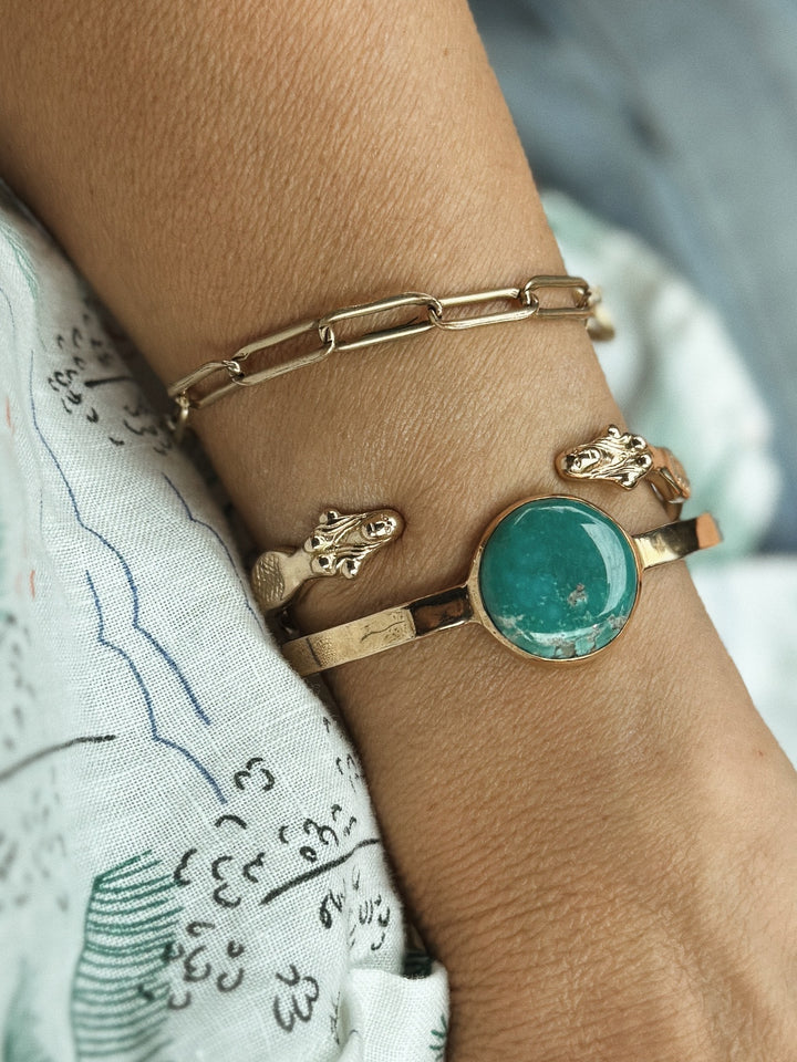 Person Wears the MIMOSA Handcrafted Collectors Chain Bracelet, Mermaid Bracelet, and Turquoise Bracelet