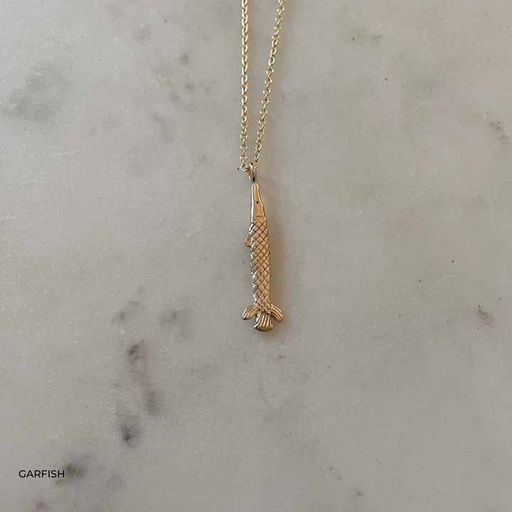 Gold Gar Fish Pendant Necklace from MIMOSA Handcrafted