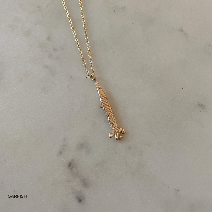 Gold Gar Fish Pendant Necklace from MIMOSA Handcrafted