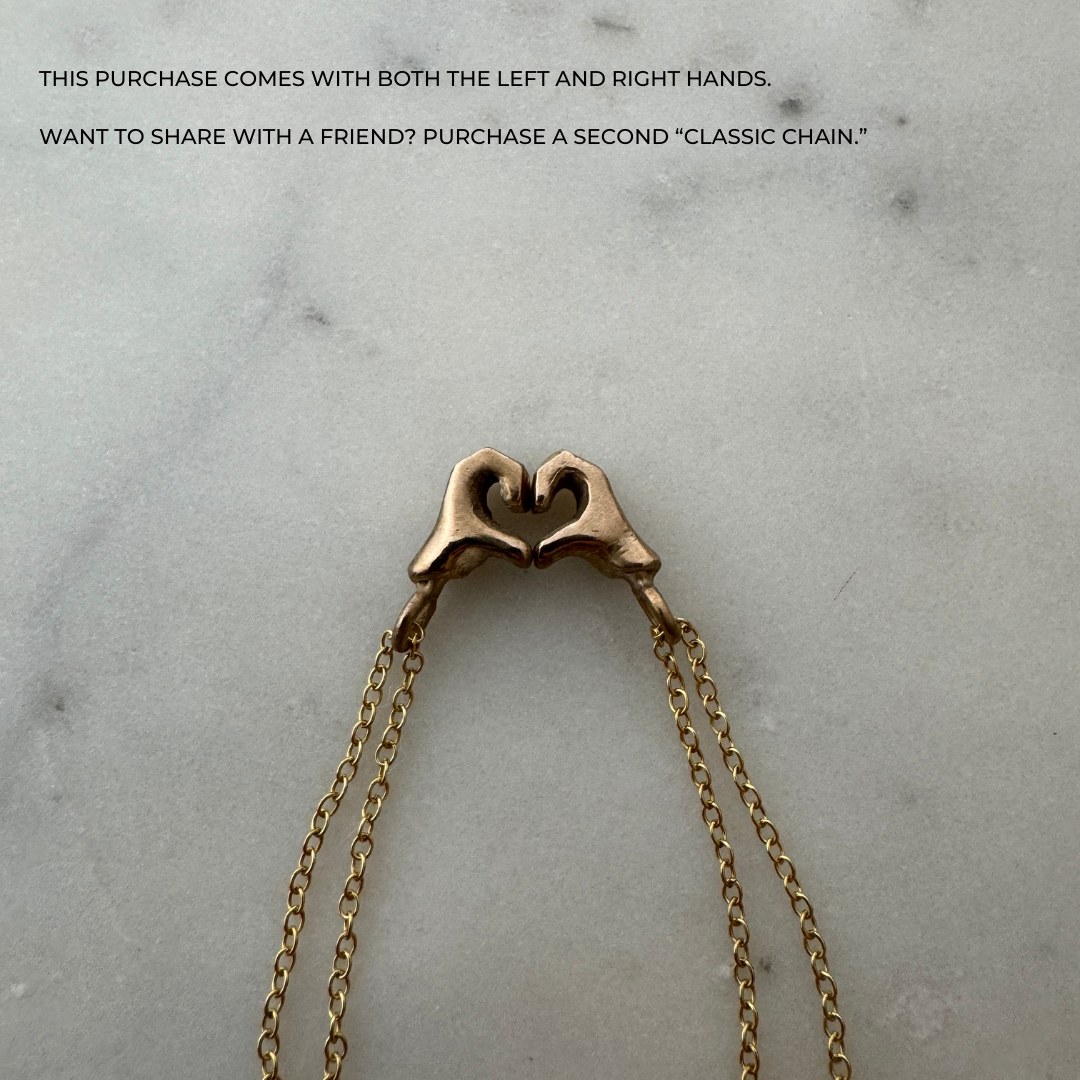 ARCHIVE — HEART HAND PENDANTS