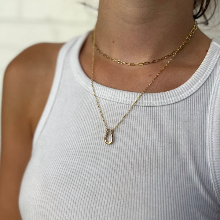Woman Wearing Handcrafted Lucky Horseshoe Pendant Necklace