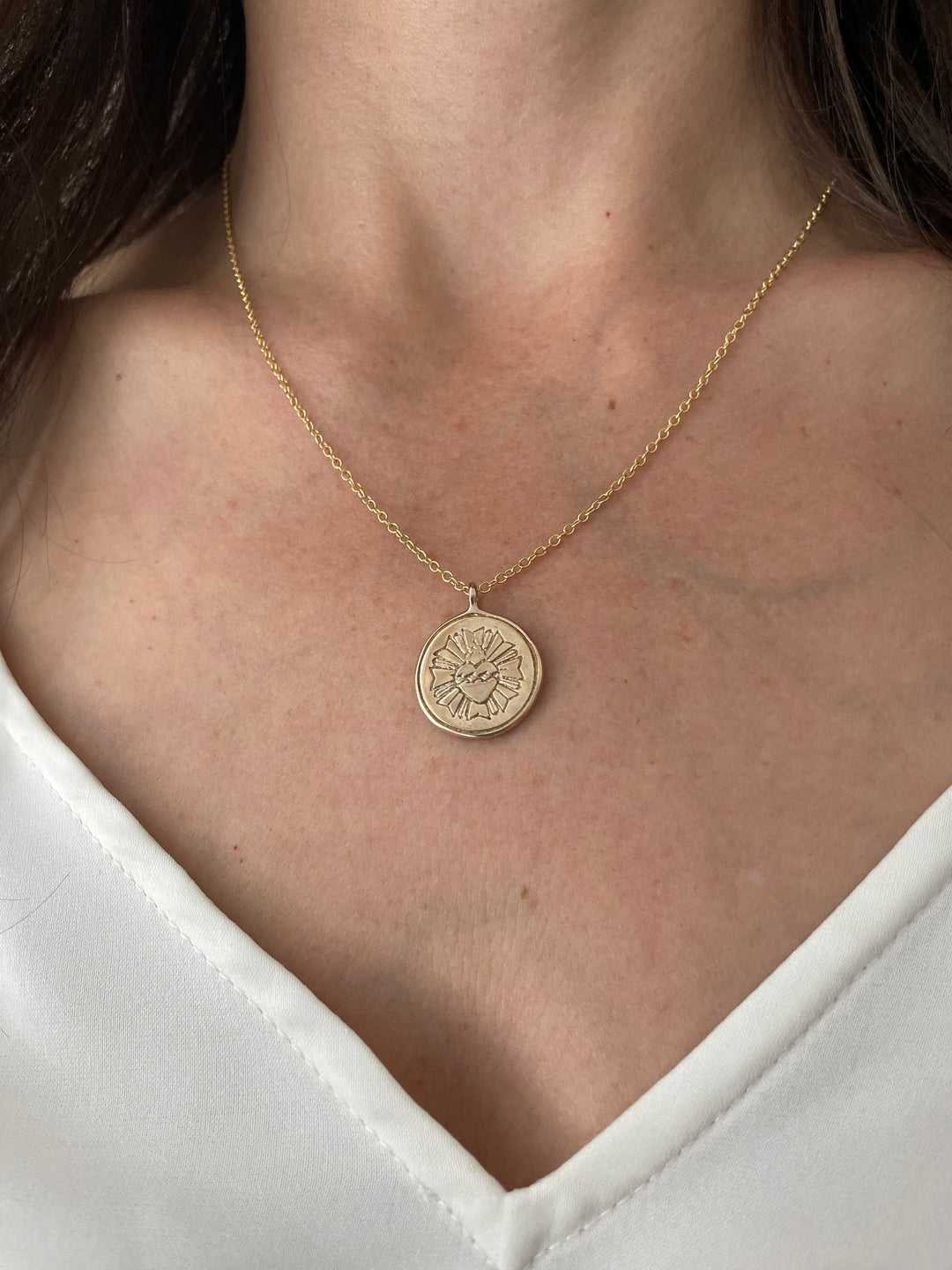 Woman Wearing Bronze Handmade Sacred Heart Pendant Necklace