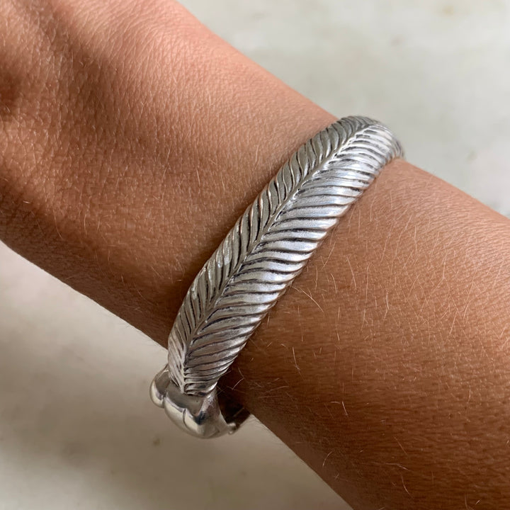 Person wearing Squirrel Cuff in Sterling Silver