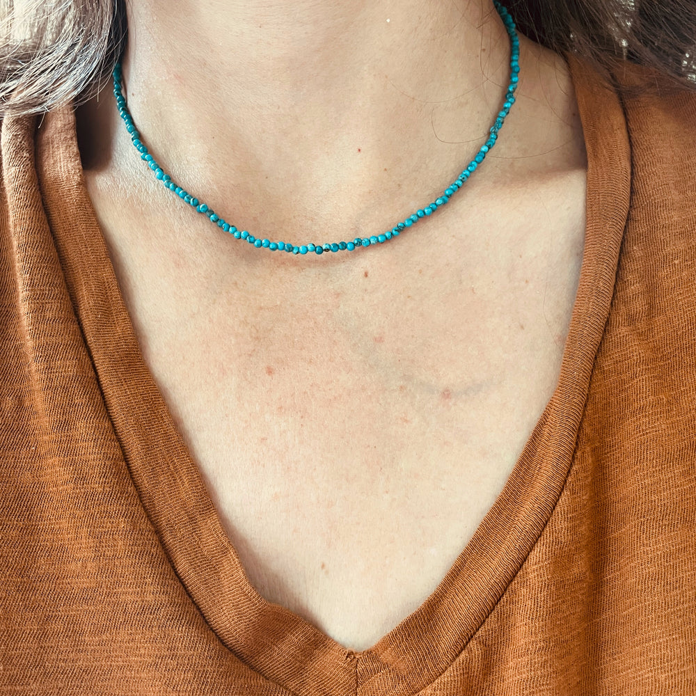 Woman Wearing Natural Turquoise Beaded Necklace