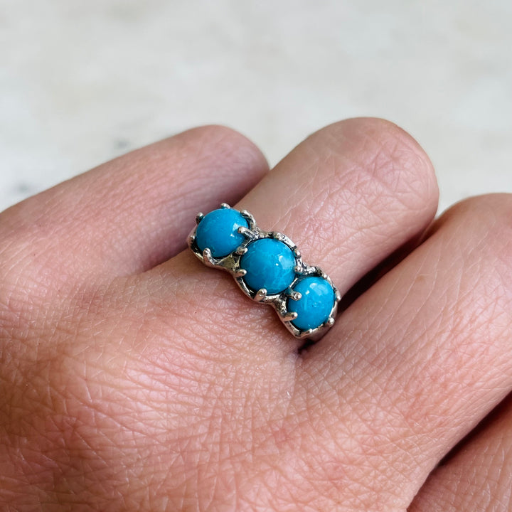 Woman Wearing Handmade Sterling Silver 3 Turquoise Stone Rosie Ring