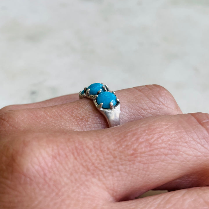 Woman Wearing Handmade Sterling Silver 3 Turquoise Stone Rosie Ring