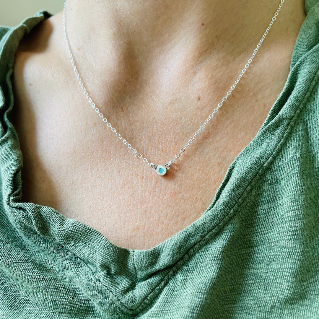 Woman Wearing Handmade Sterling Silver Grace Pendant Necklace With Turquoise Stone