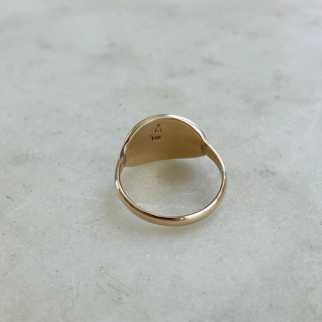 Handcrafted 14K Yellow Gold Ring With The Words "The Best Is Yet To Come" Stamped Into The Oval Face