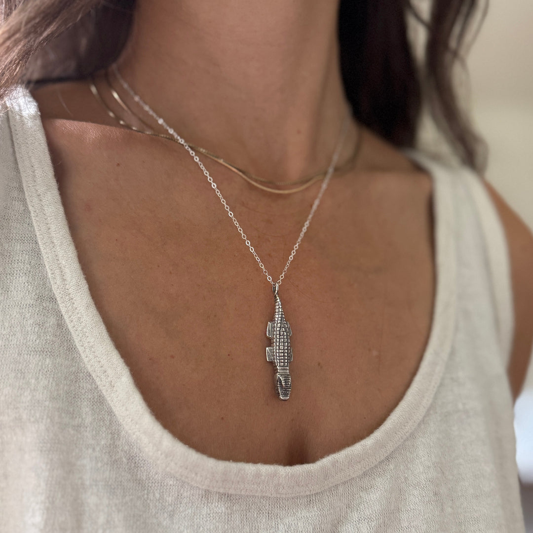 Woman Wearing Handcrafted Sterling Silver Alligator Pendant Necklace