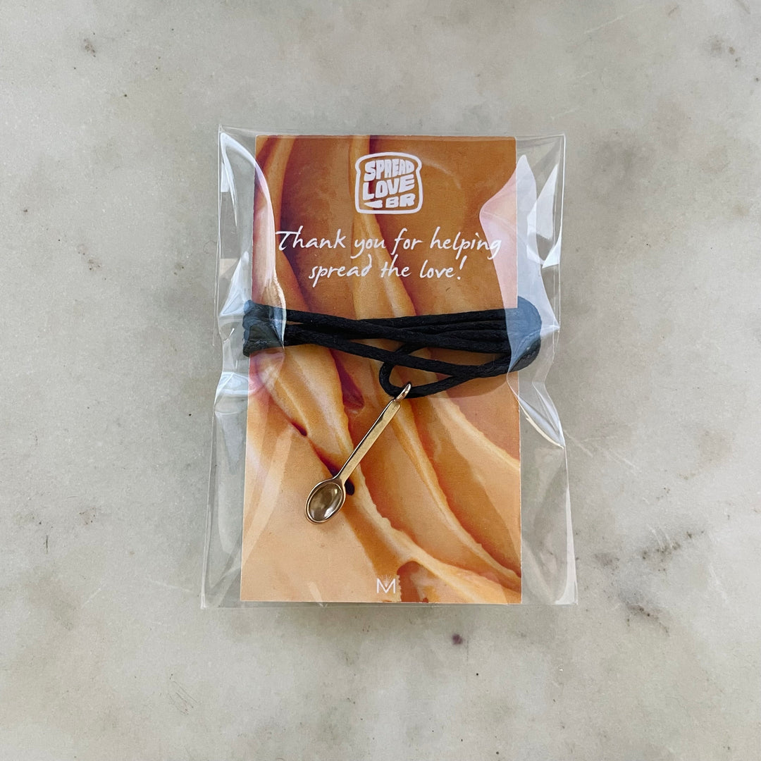 A Bronze Spoon Necklace Fundraiser for MIMOSA's Peanut Butter Drive in Baton Rouge.