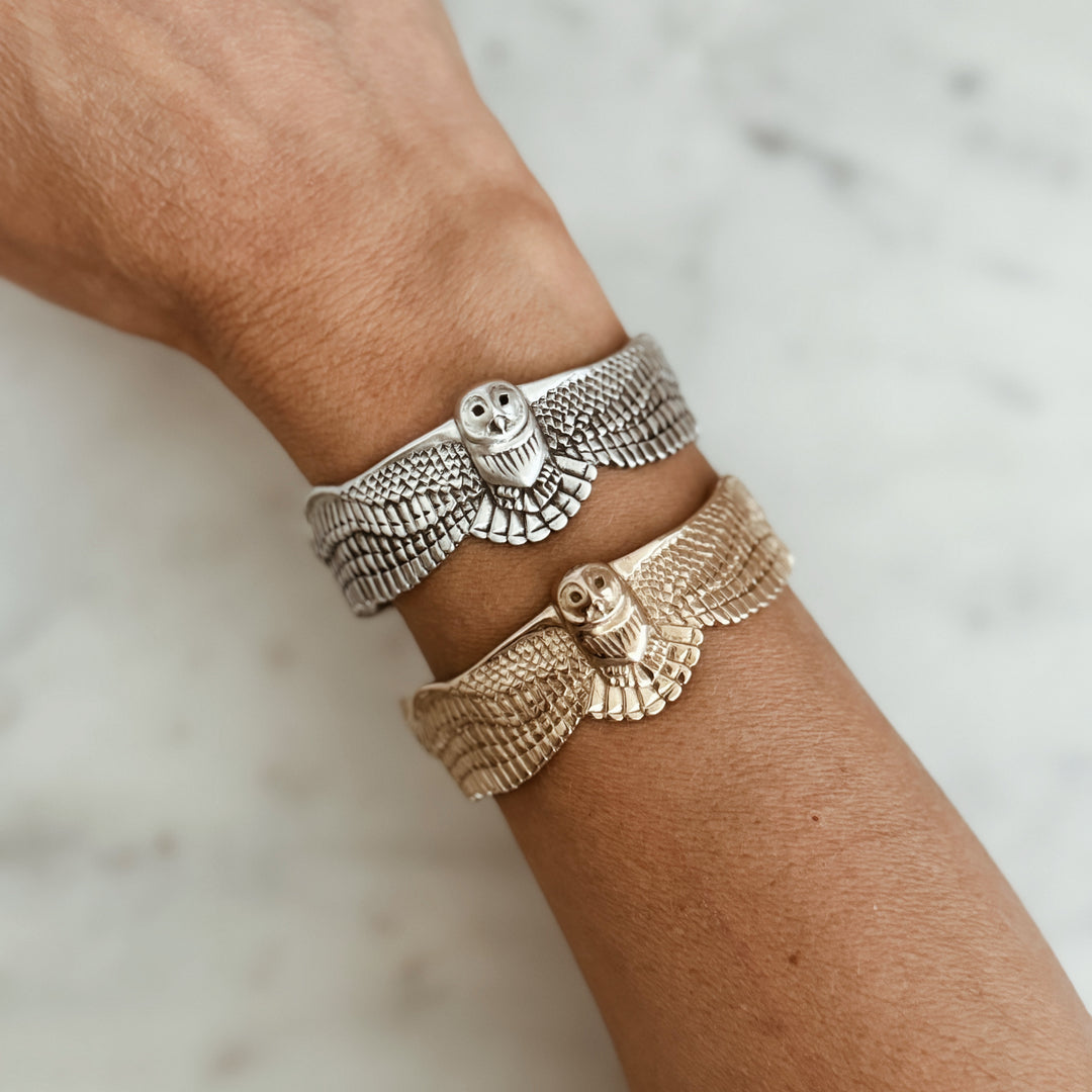 Person Wears the MIMOSA Handcrafted Owl Cuff in Sterling Silver and Bronze