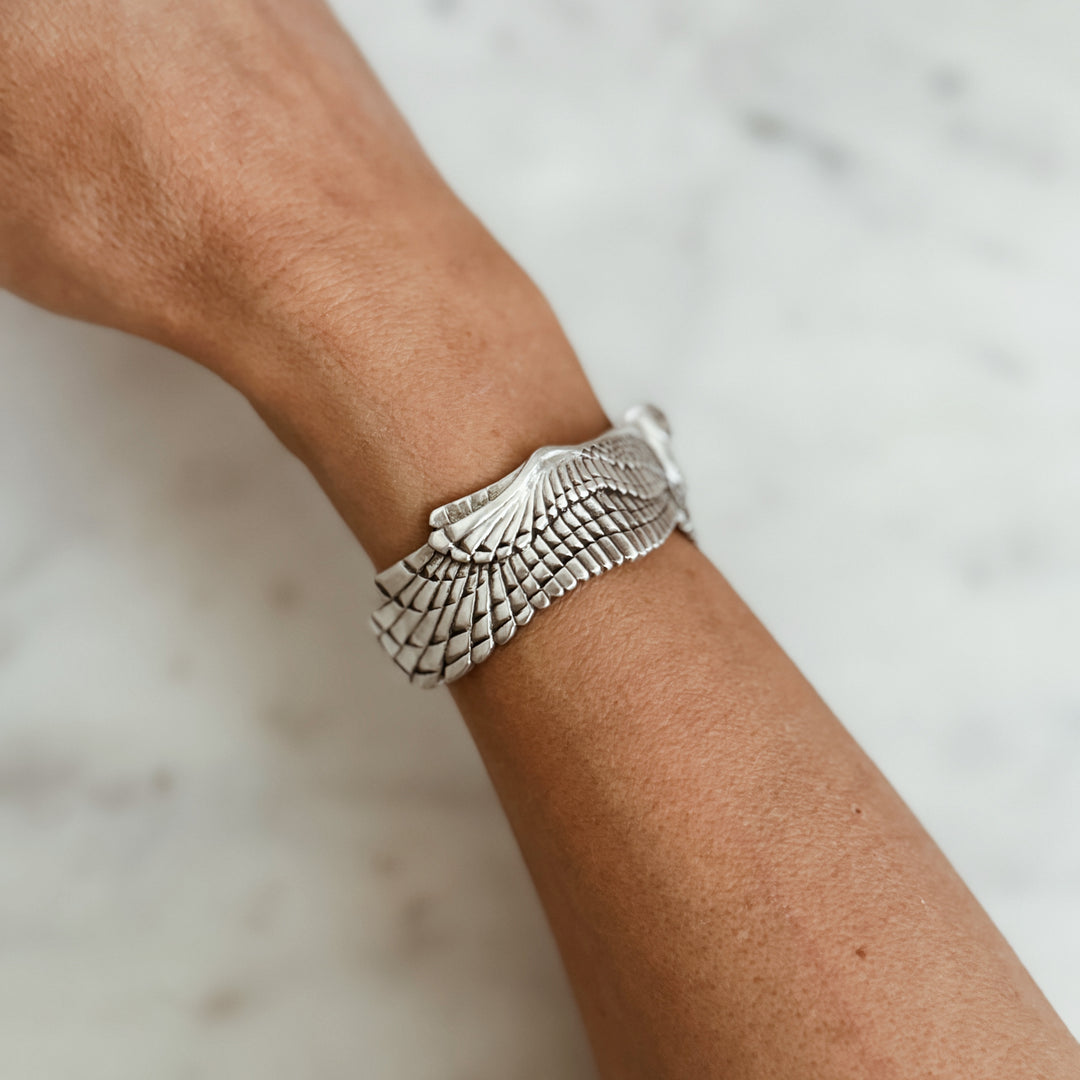 Person Wears the MIMOSA Handcrafted Owl Cuff in Sterling Silver