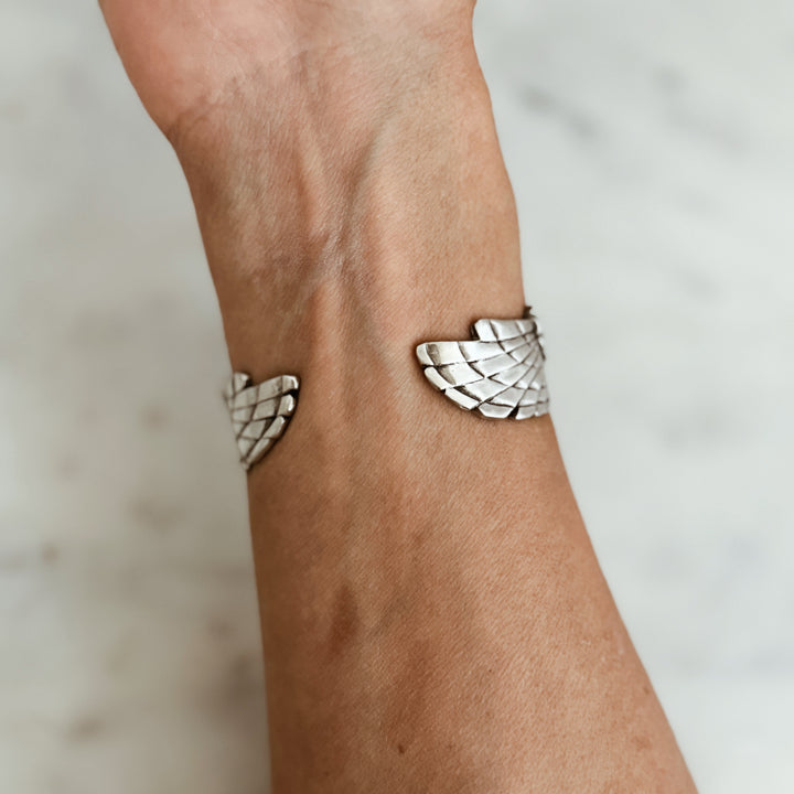 Person Wears the MIMOSA Handcrafted Owl Cuff in Sterling Silver