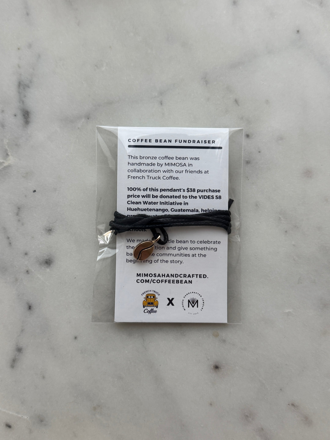Bronze Coffee Bean Pendant on Black Cotton Cord from MIMOSA Handcrafted
