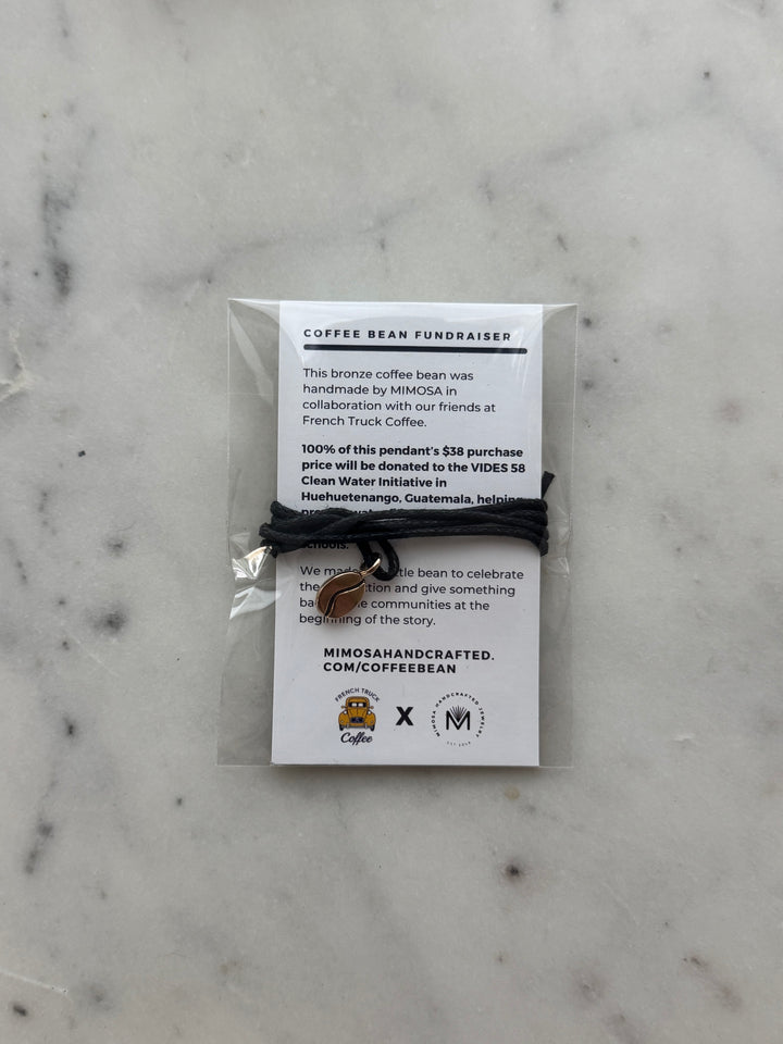 Bronze Coffee Bean Pendant on Black Cotton Cord from MIMOSA Handcrafted