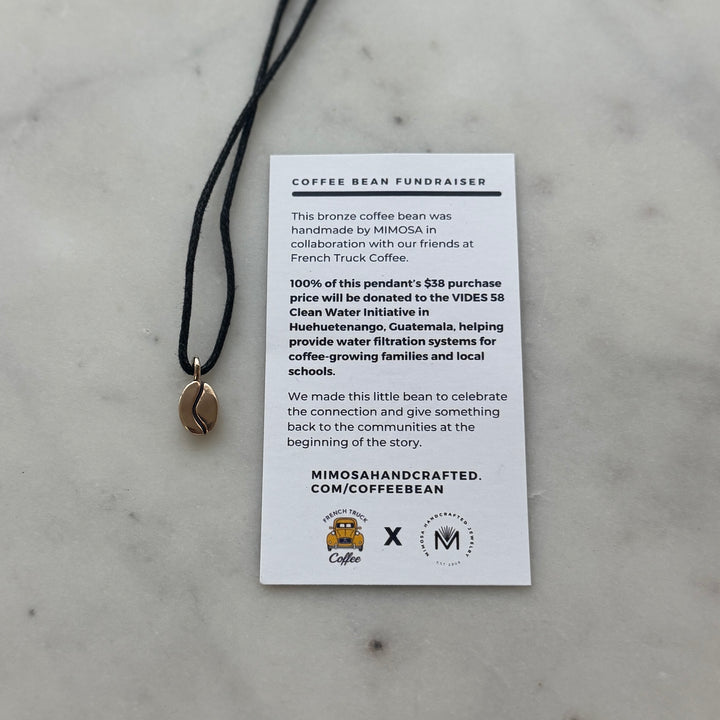 Bronze Coffee Bean Pendant on Black Cotton Cord from MIMOSA Handcrafted