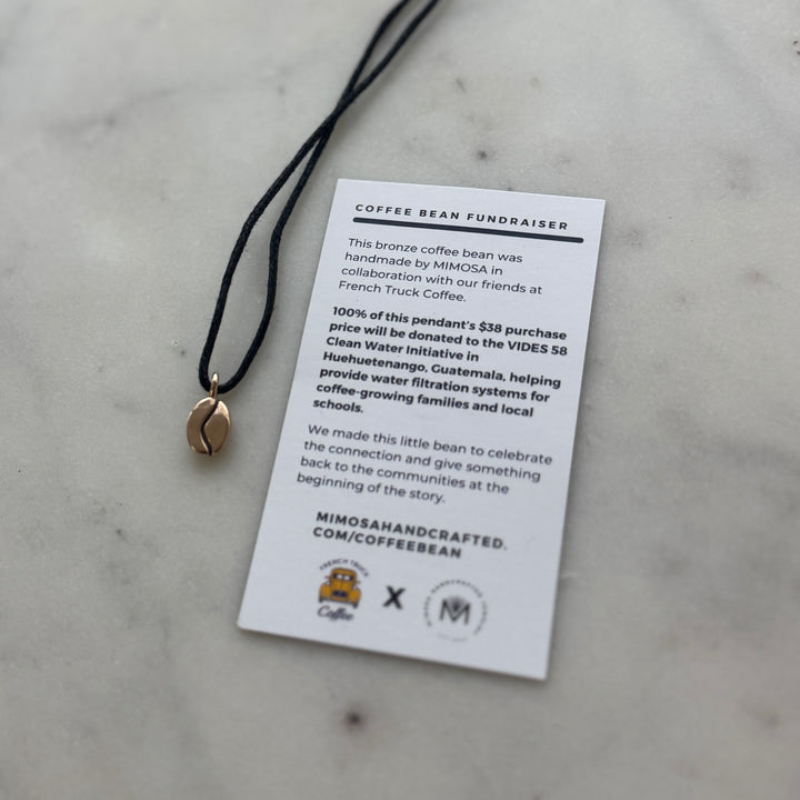 Bronze Coffee Bean Pendant on Black Cotton Cord from MIMOSA Handcrafted