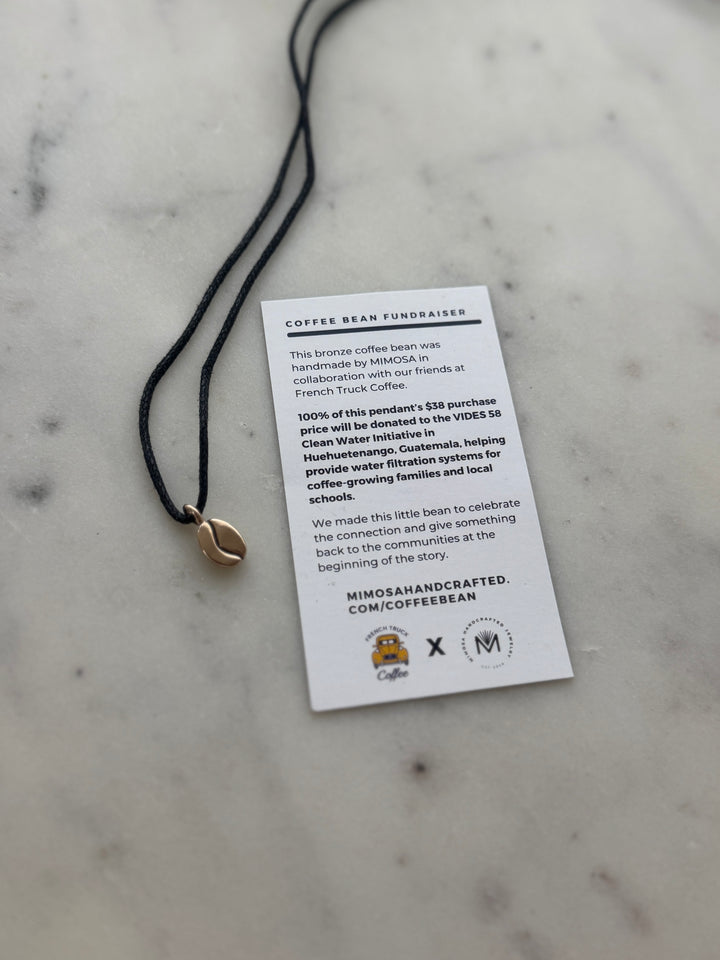 Bronze Coffee Bean Pendant on Black Cotton Cord from MIMOSA Handcrafted