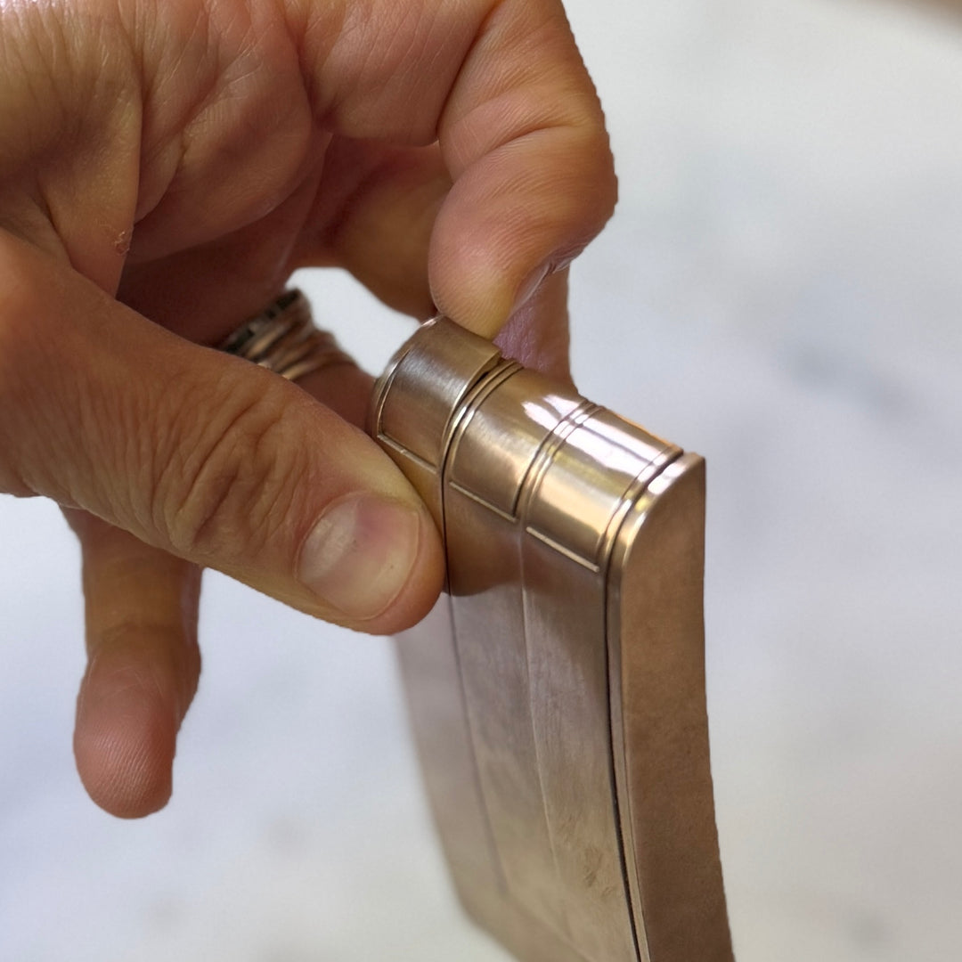 THE BELT BUCKLE