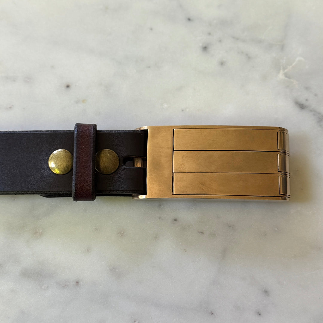THE BELT BUCKLE